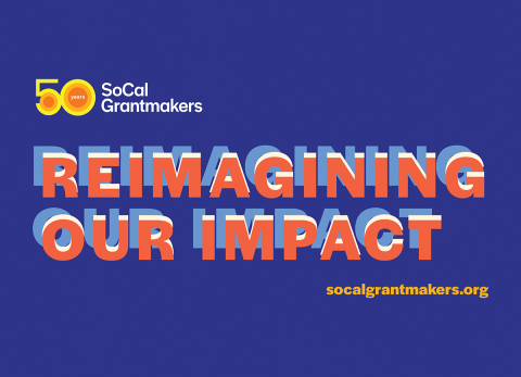 Image that reads Reimagining Our Impact in orange text against a dark blue background. 